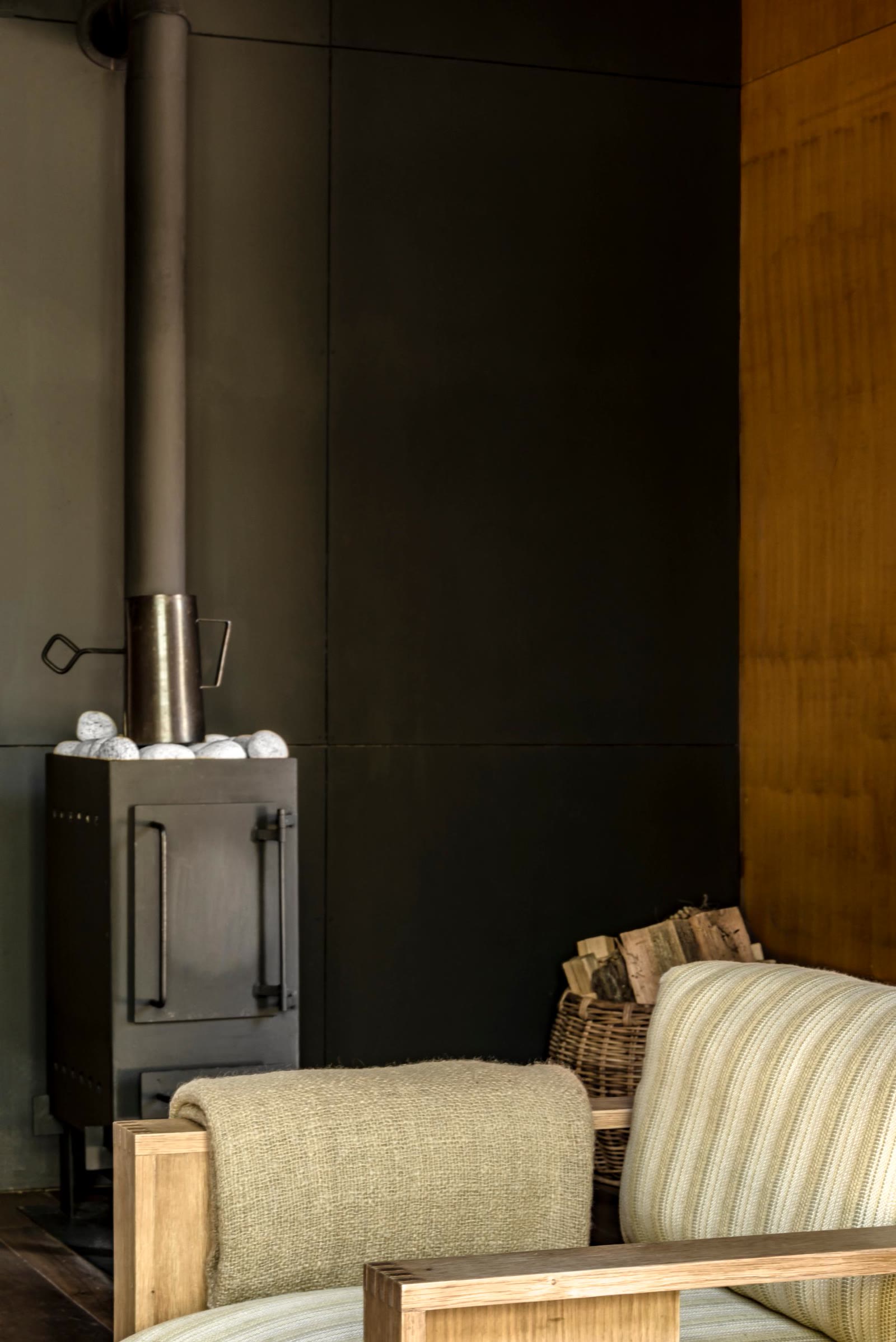 A suite interior with the bukhari stove at Amankora Paro, Bhutan