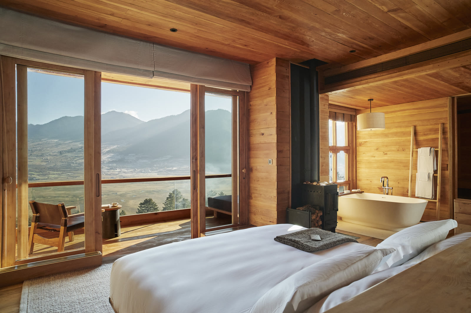 The bedroom of a Suite at Six Senses Gangtey, Bhutan