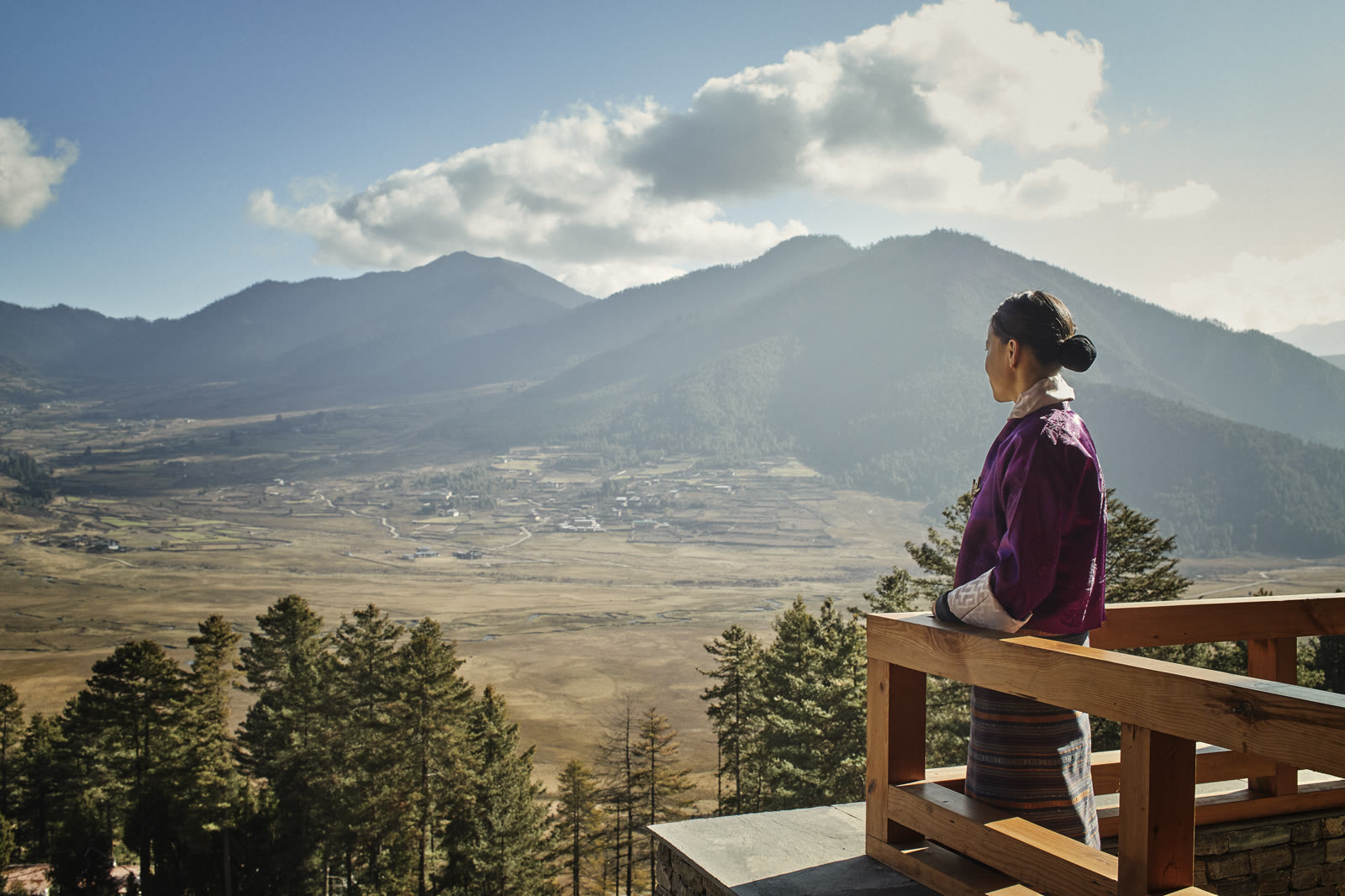 A Six Senses host looking out over the Phobjikha Valley, Gangtey, Bhutan