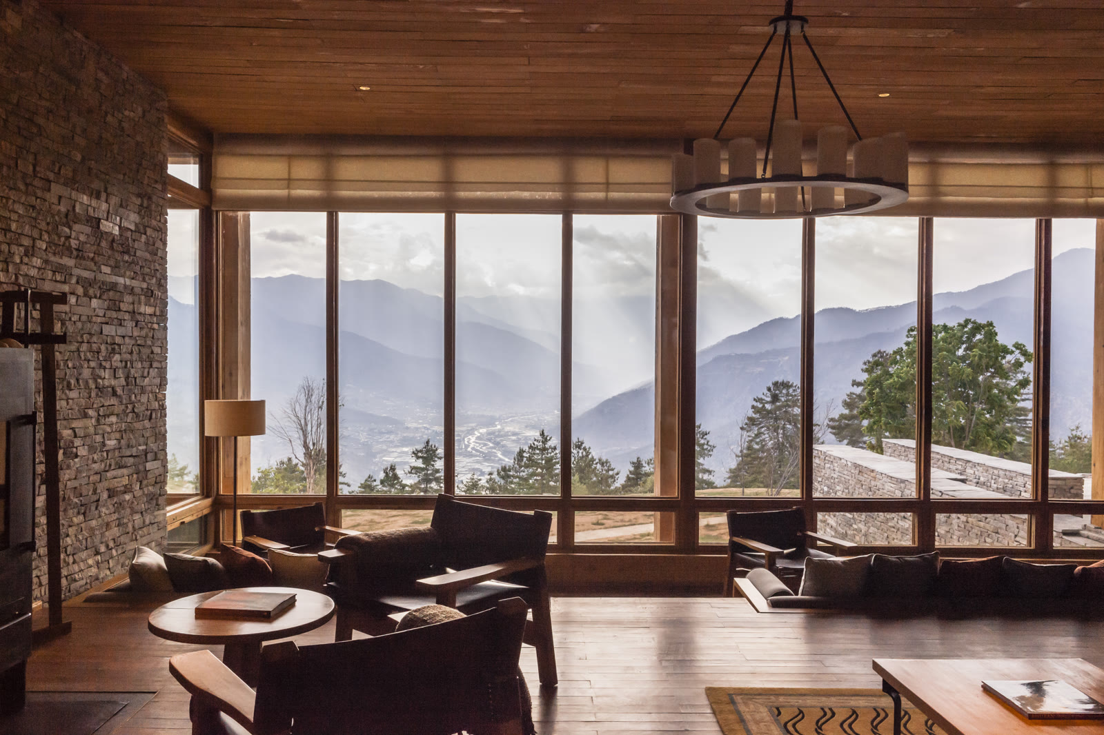 The living room of a Suite at Six Senses Paro, Bhutan