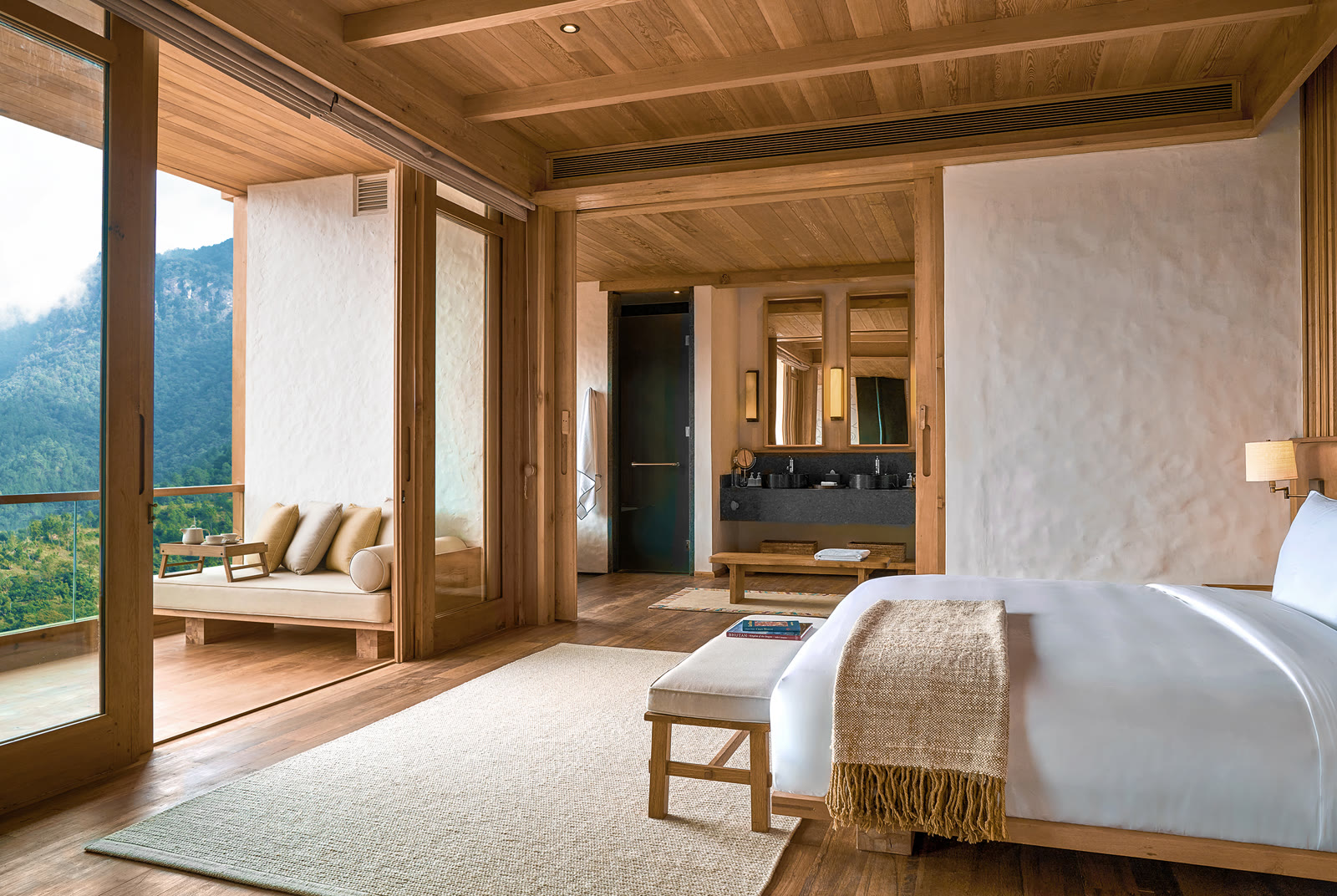 The bedroom of a Lodge Suite at Six Senses Thimphu, Bhutan