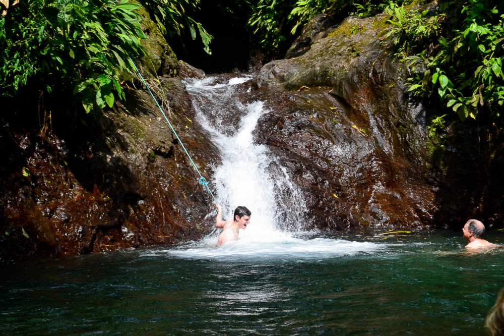 A waterfall on the Rainmaker hanging-bridges tour