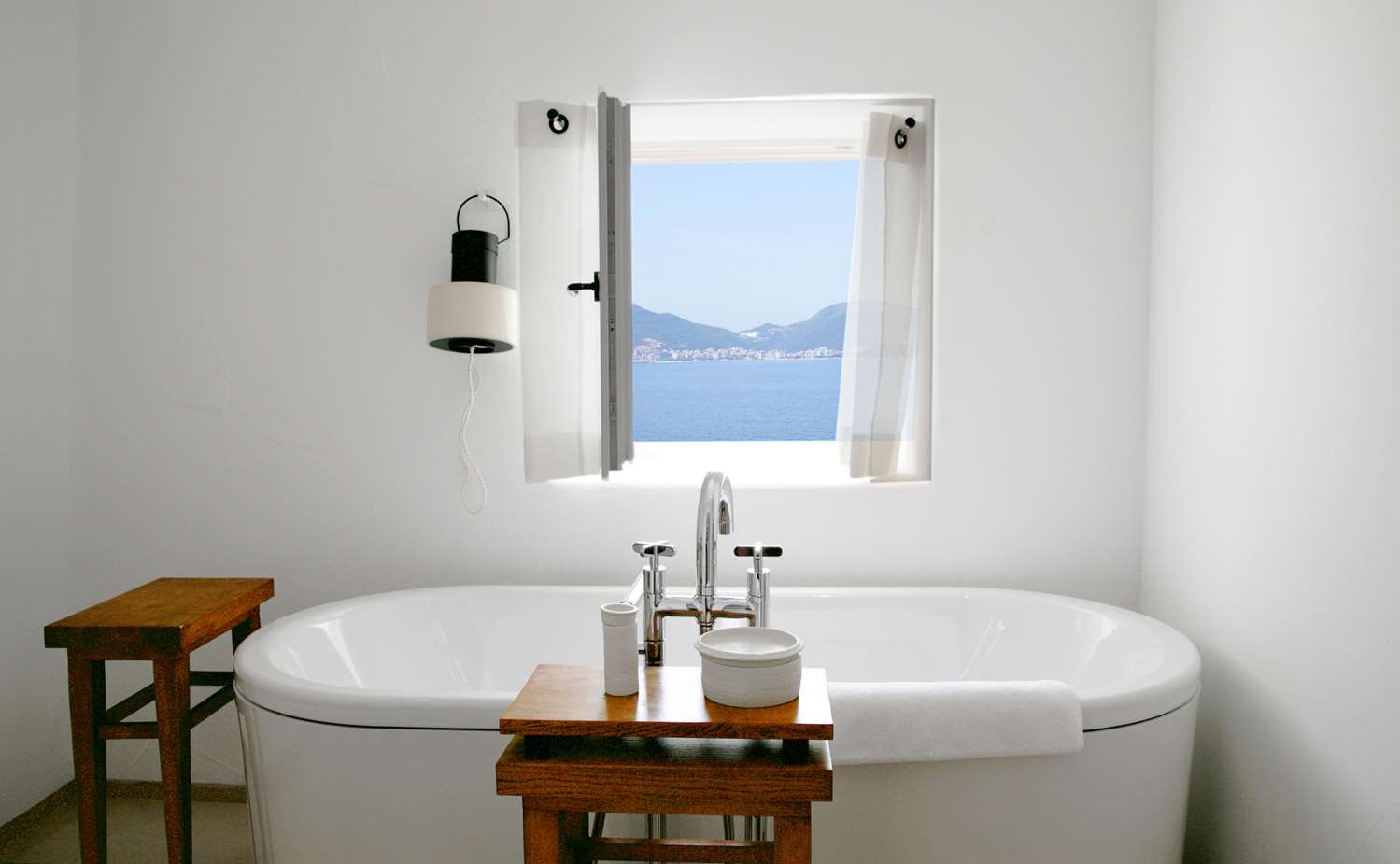 A bathroom with a sea view at Aman Sveti Stefan