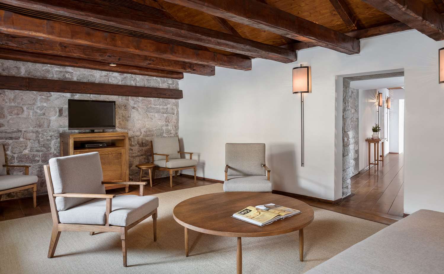 The sitting room of a cottage at Aman Sveti Stefan