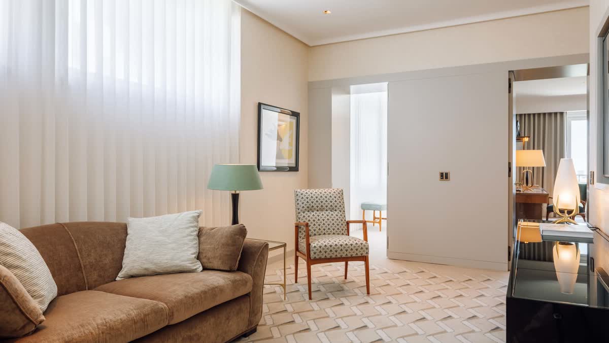 The living room of a One-Bedroom Suite at the Four Seasons Ritz Lisbon
