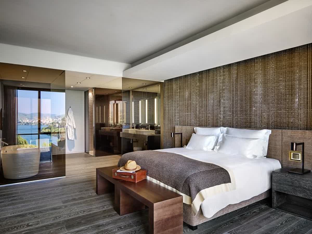 Suite bedroom with river views at Six Senses Douro Valley