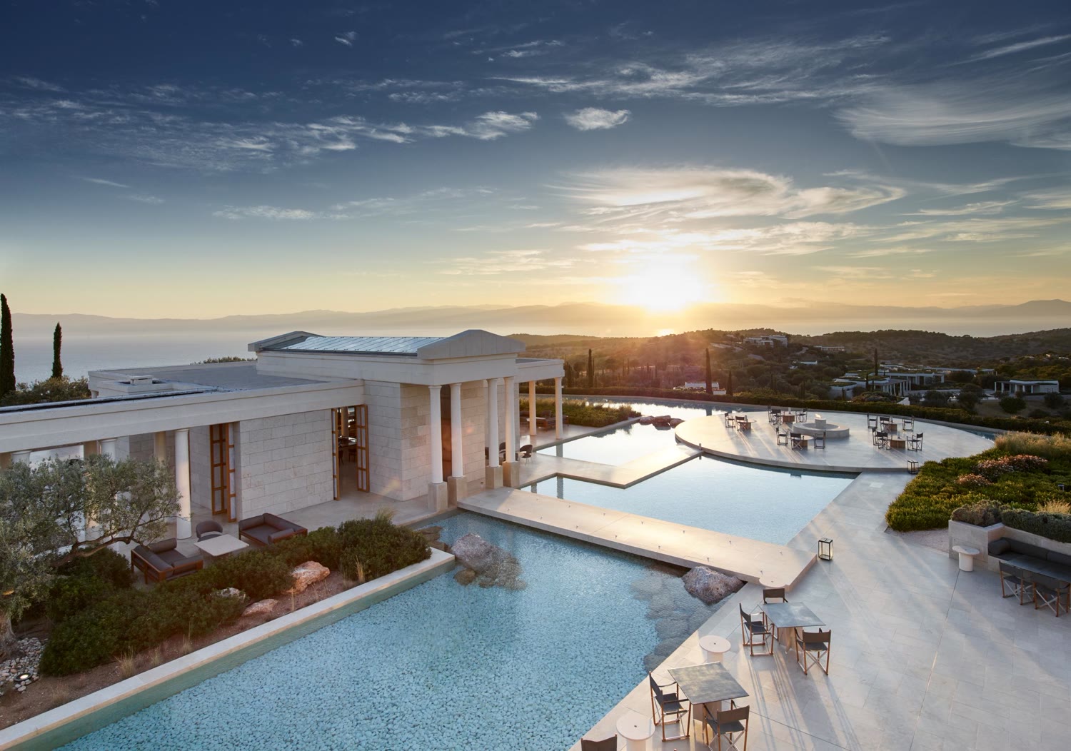 The Aman estate of Amanzoe on a Peloponnese hilltop at sunset
