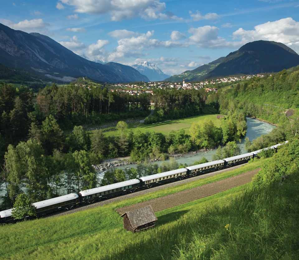 Venice Simplon-Orient-Express winding through the Alps