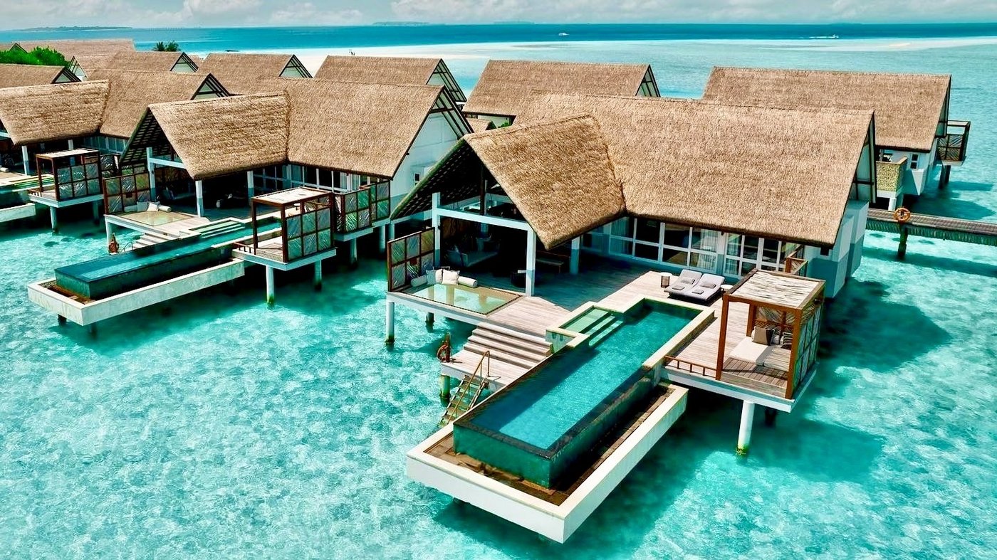 Four Seasons Resort Maldives at Landaa Giraavaru thatched overwater villas with private plunge pools
