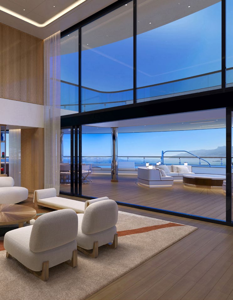 A double-height suite aboard Four Seasons I opening to a private terrace and the sea