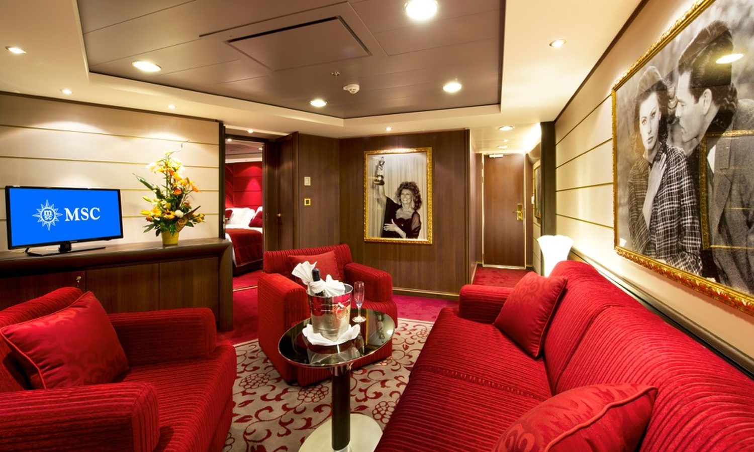 MSC Yacht Club Executive Family Suite lounge with classic cinema-themed decor
