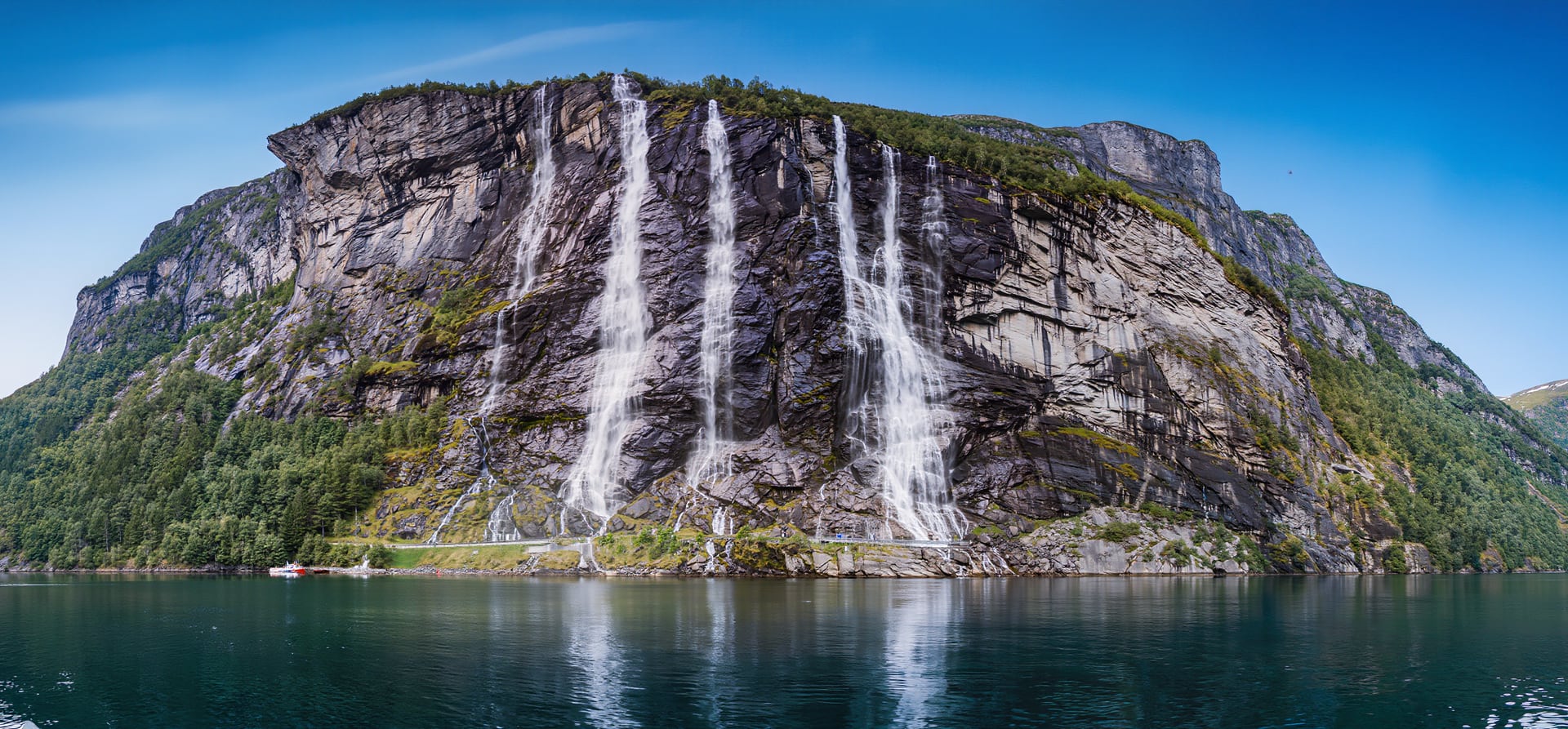 A Journey Of Sunlit Fjords, Waterfalls & Historic Harbour Towns