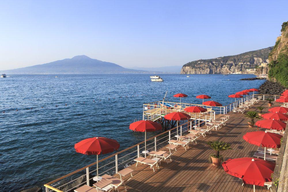 Grand Hotel Royal beach club, Sorrento, with Vesuvius across the bay