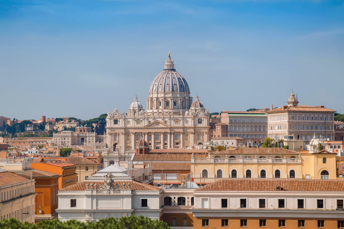 St Peter's dome above the rooftops of Rome