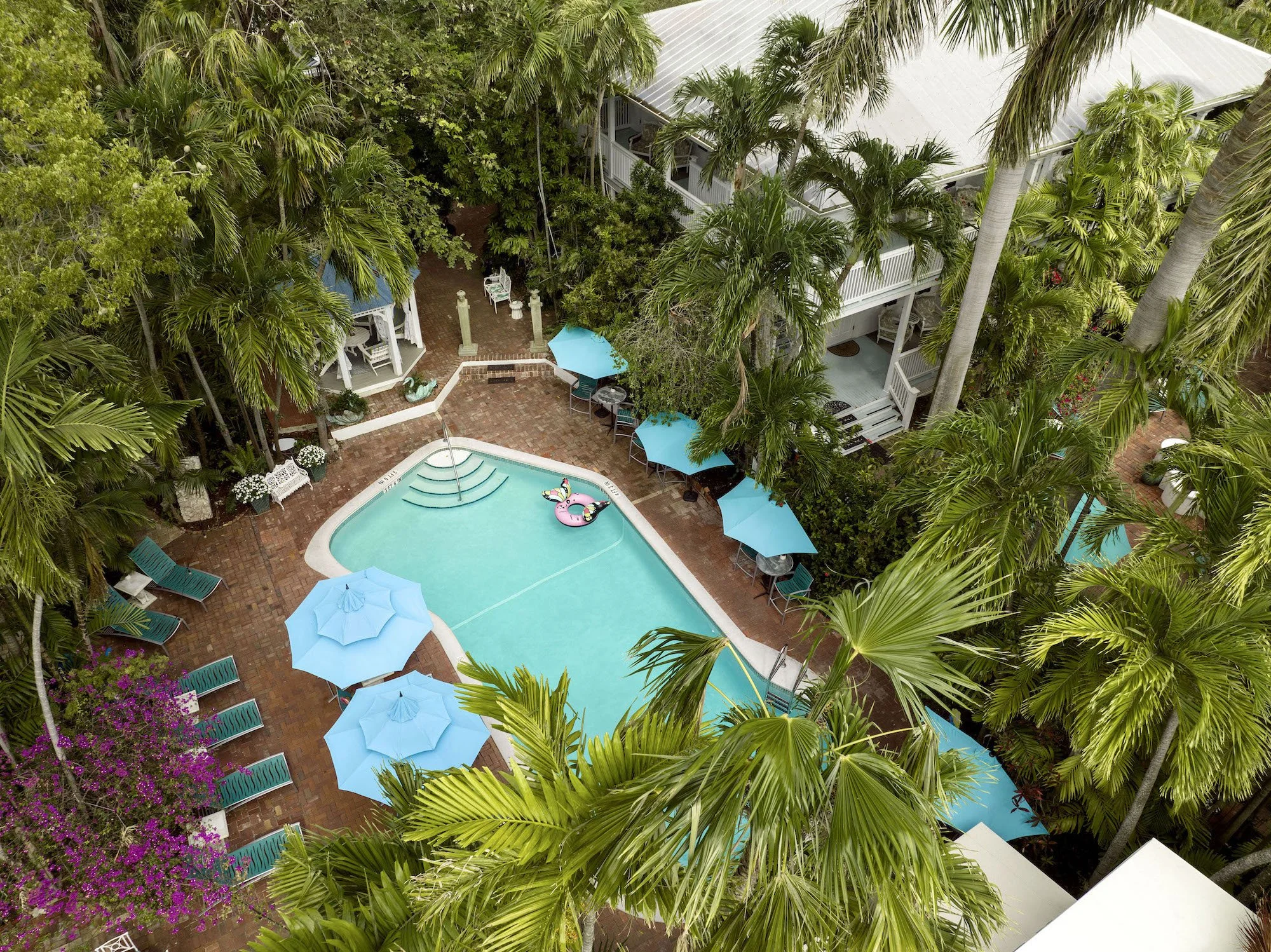 Aerial view of the pool set in the tropical garden at The Gardens Hotel, Key West