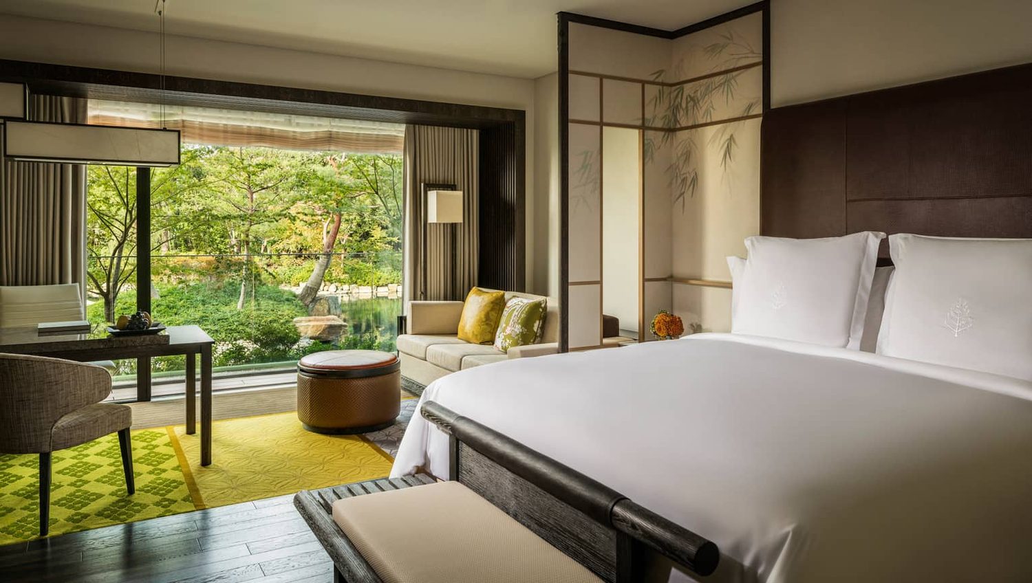 A Four Seasons Kyoto guest room with garden view