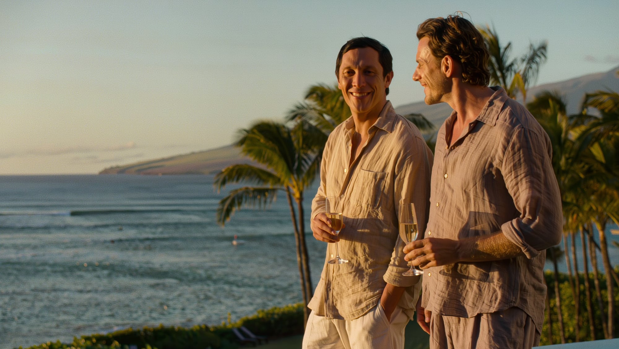 A couple on a resort terrace at sunset in Wailea, Maui