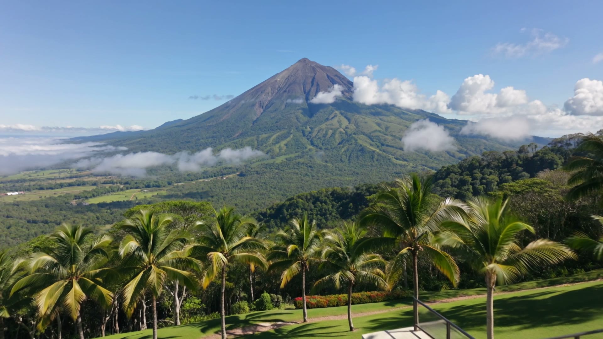 The Arenal volcano rising over the rainforest