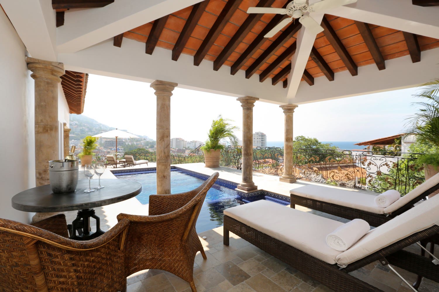 A private suite pool with a bay view at Casa Kimberly