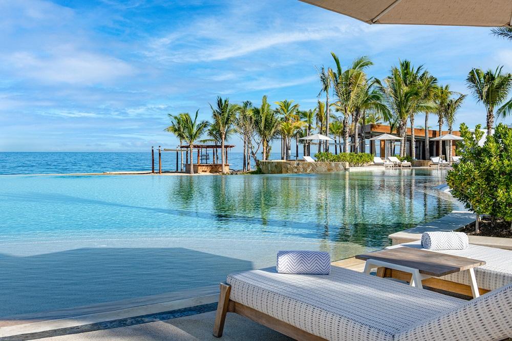 The pool and loungers at Conrad Punta de Mita