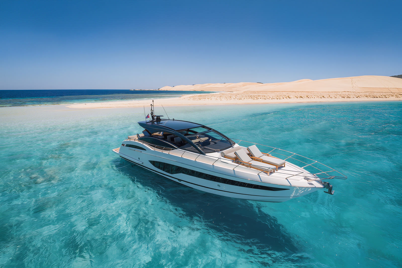 A private yacht off the white sands of Formentera