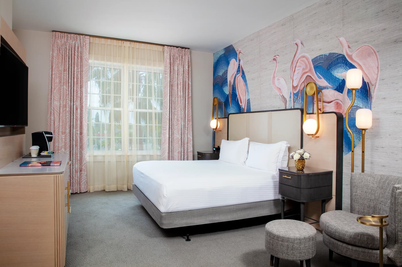 A Luxury King room with coastal-chic decor at The Don CeSar, St. Pete Beach