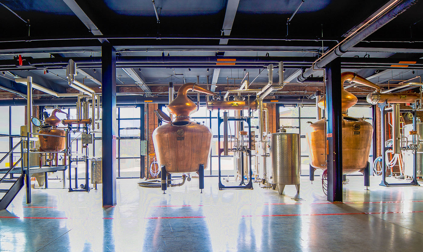 Copper pot stills at a craft distillery in St. Petersburg