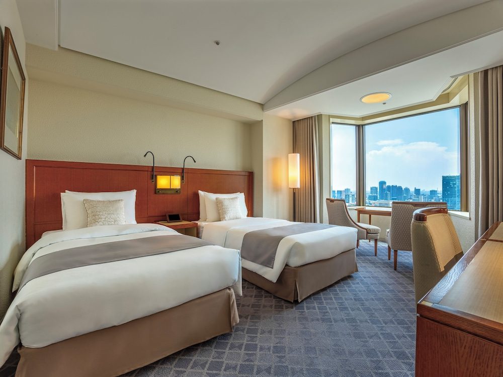 An Imperial Hotel guest room with city view